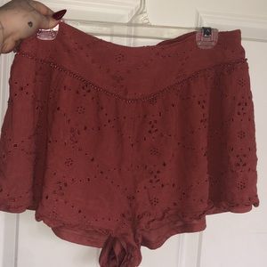 burnt orangey red flowy shorts